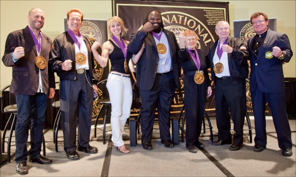 Pictured are last years Inductee Class of 2012-UFC World Champion Randy Couture, Gov Schwarzenegger, 6X Ms Olympia Corey Everson, WWE World Champion Mark Henry, Widow of fitness Icon Jack Lalanne- Elaine, and Co-Founder of Arnold Sports Festival James Lorimer.
